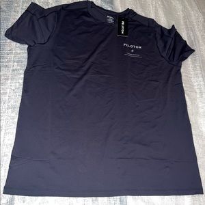 Brand new dark blue Peloton shirt.